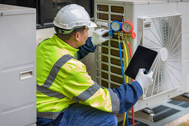 Professional Hvac technician working in Sunderland, MD